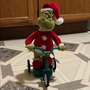 Brand New Musical Christmas Grinch Plush Toy on Tricycle.